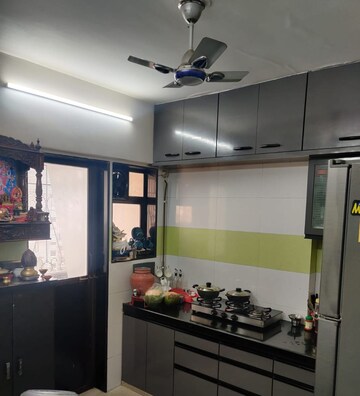Kitchen in 2 BHK Apartment at Yashomati Society, Chembur – for Sale