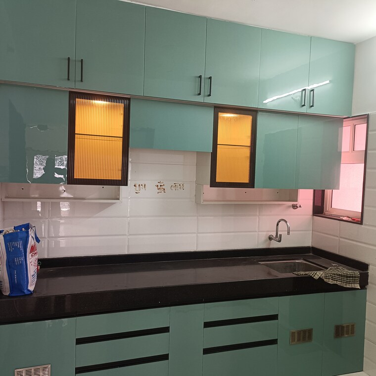 Kitchen, aaiji-pink-city 2 Bedroom 705 Sq.Ft. Apartment In Lohgaon Pune 9428014