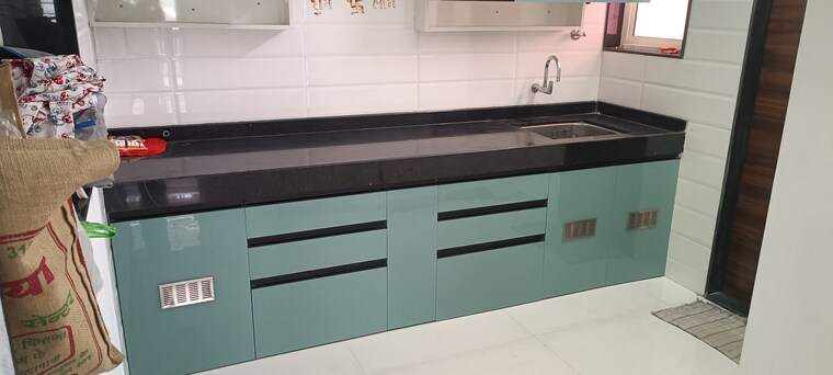 Kitchen, aaiji-pink-city 2 Bedroom 705 Sq.Ft. Apartment In Lohgaon Pune 9428014