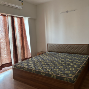 Bedroom in 3 BHK Apartment at Godrej Woods, Sector 43 – for Rent