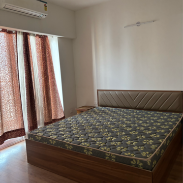 Bedroom in 3 BHK Apartment at Godrej Woods, Sector 43 – for Rent