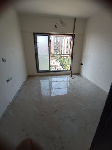 Master Bedroom in 1 BHK Apartment at Gowda Palash, Malad West – for Sale