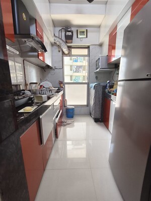 Kitchen in 1 BHK Apartment at Dharti Pressidio, Kandivali West – for Rent