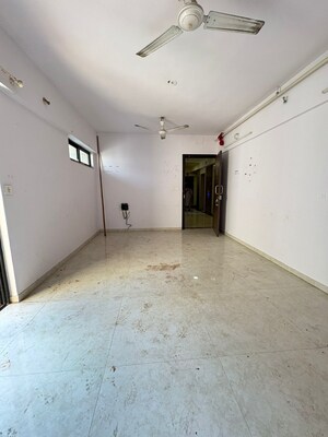 Living Room in 1 BHK Apartment at Lodha Palava City Lakeshore Greens, Dombivli East – for Sale