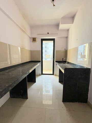 Kitchen in 1 BHK Apartment at Lodha Palava City Lakeshore Greens, Dombivli East – for Sale