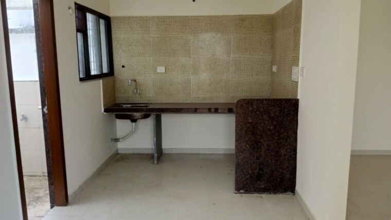 Kitchen, om-signet-park 2 Bedroom 950 Sq.Ft. Apartment In Ravet Pune 9428153