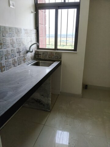 Kitchen in 1 BHK Apartment at Ganesh Tower, Naupada – for Sale