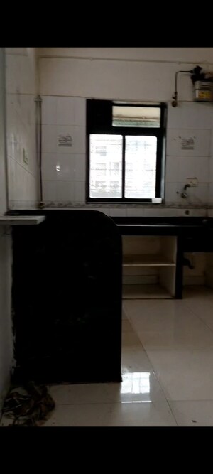 Kitchen in 2 BHK Apartment at Haware Splendor, Kharghar – for Rent