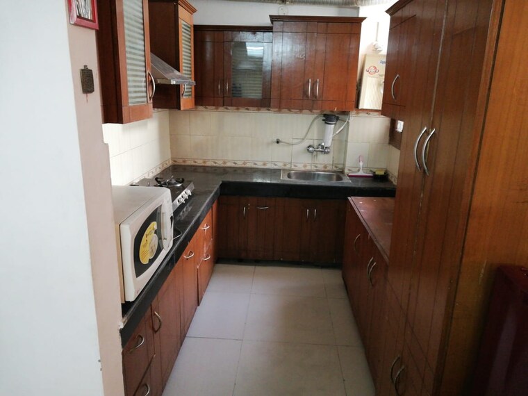 Kitchen, maxxus-elanza 3 Bedroom 1800 Sq.Ft. Apartment In International Airport Road Zirakpur 9428367
