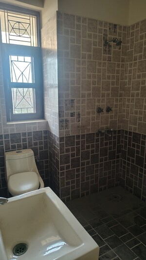 Bathroom in 3 BHK Apartment at Metro Suites Glitz, Vasundhara Sector 2 – for Sale