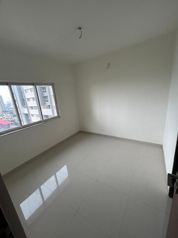 Master Bedroom in 1 BHK Apartment at Omkar Signet, Malad East – for Rent