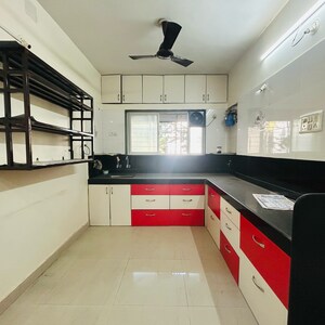 Kitchen in 2 BHK Apartment at Ganesh Karishma, Ideal Colony – for Sale
