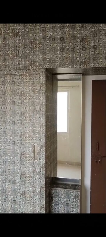 Building Lobby in 2 BHK Apartment at Signature Orchard Avenue 2, Sector 93 – for Rent