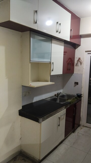 Kitchen in 2.5 BHK Apartment at Homes 121, Sector 121 – for Rent