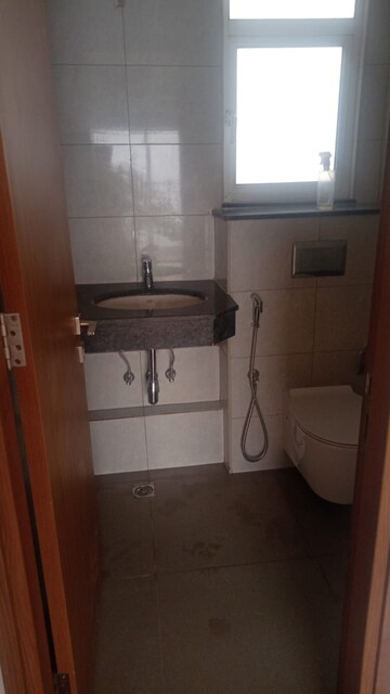 Bathroom in 2 BHK Apartment at Godrej Woods, Sector 43 – for Sale