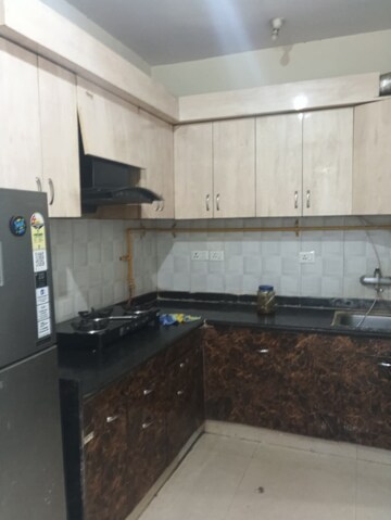 Kitchen in 3 BHK Apartment at Surya Aastha Greens, Sector 4 Greater Noida – for Rent