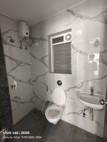 Bathroom in 1 BHK Apartment at Raunak Bliss, Ghodbunder Road – for Rent
