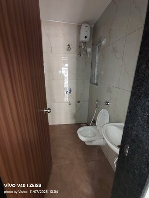 Bathroom in 1 BHK Apartment at Raunak Bliss, Ghodbunder Road – for Rent