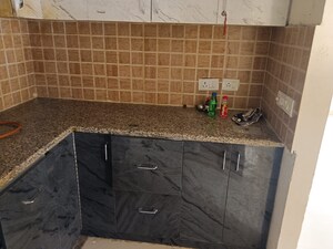 Kitchen in 2 BHK Apartment at Mahagun Mywoods II, Sector 16c Greater Noida – for Rent