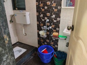 Bathroom in 2 BHK Apartment at Jairajratna CHS Ltd, Goregaon West – for Sale