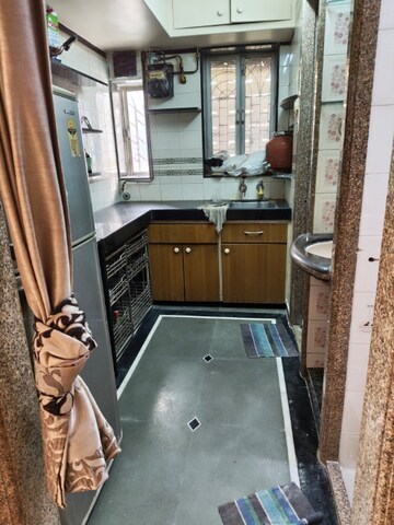 Kitchen in 2 BHK Apartment at Shree Lucky Tower, Kandivali West – for Rent