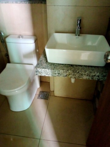 Bathroom in 1 BHK Apartment at Kalpataru Immensa, Kolshet Road – for Rent