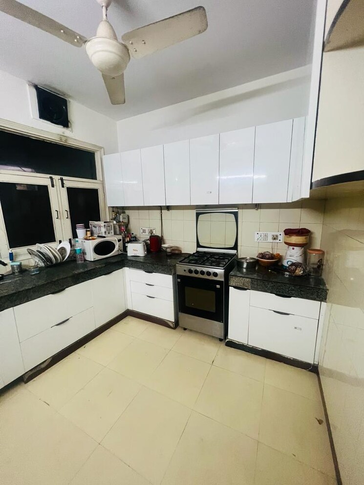 Kitchen, panchsheel park 3 Bedroom 2000 Sq.Ft. Builder Floor In Panchsheel Park Delhi 9429117
