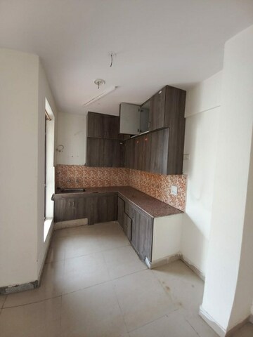 Kitchen in 2 BHK Apartment at Ninex RMG Residency, Sector 37c – for Rent