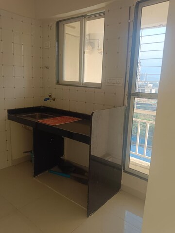 Kitchen in 1 BHK Apartment at Seven Apna Ghar Phase 2 Plot A, Mira Road – for Sale