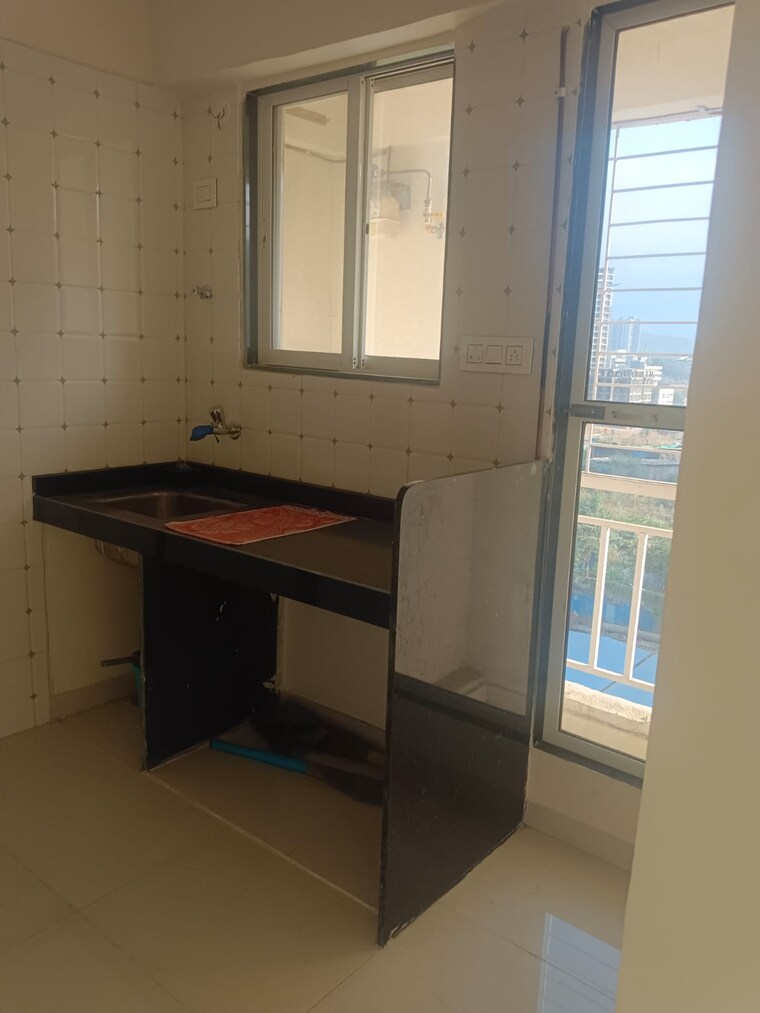Kitchen, seven-apna-ghar-phase-2-plot-a 1 Bedroom 560 Sq.Ft. Apartment In Mira Road Thane 9429292