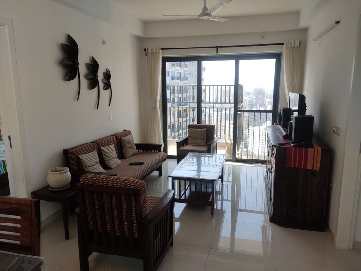 Living Room, amanora-gold-towers 2 Bedroom 614 Sq.Ft. Apartment In Hadapsar Pune 9429422