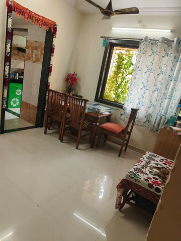 Living Room in 1 BHK Apartment at Sadguru Garden CHS, Ghodbunder Road – for Sale