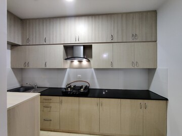 Kitchen in 2.5 BHK Apartment at Bhartiya Nikoo Homes Phase 2, Thanisandra Main Road – for Rent