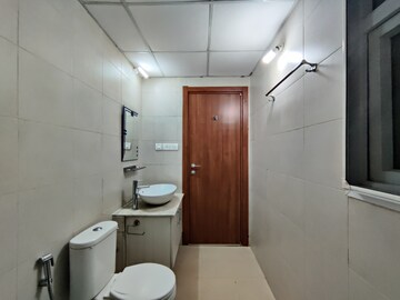 Bathroom in 2.5 BHK Apartment at Bhartiya Nikoo Homes Phase 2, Thanisandra Main Road – for Rent