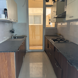 Kitchen in 3 BHK Apartment at Mahagun Mirabella, Sector 79 – for Rent