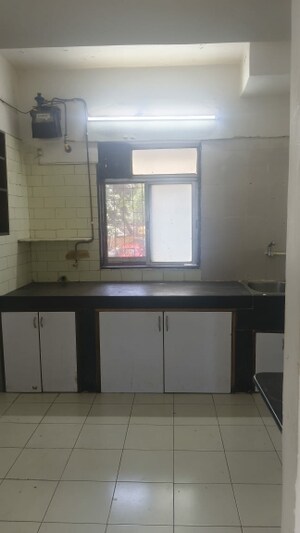 Kitchen in 3 BHK Apartment at Jal Vayu Vihar Apartments, Powai – for Sale