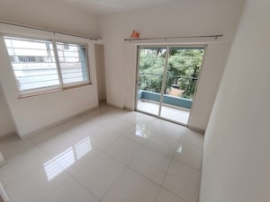 Room in 2 BHK Apartment at Kumar Primrose, Kharadi – for Rent