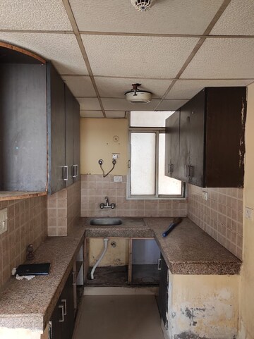 Kitchen in 2 BHK Apartment at Supertech Czar Suites, Omicron I Greater Noida – for Sale