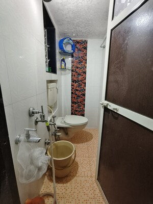 Bathroom in 2 BHK Apartment at Ganesh CHS Kalwa, Kalwa – for Rent