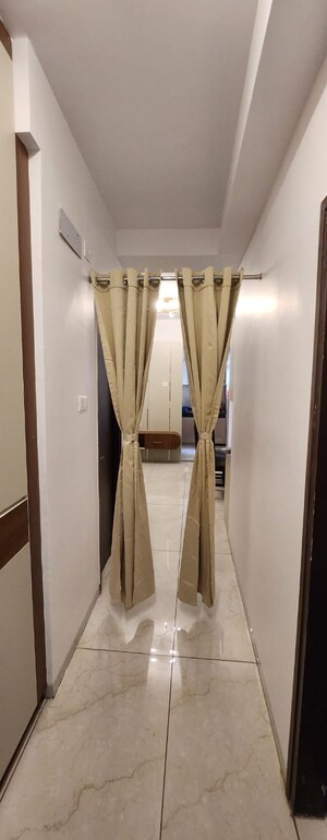 Building Lobby in 2 BHK Apartment at Ansals Celebrity Greens, Sushant Golf City – for Rent