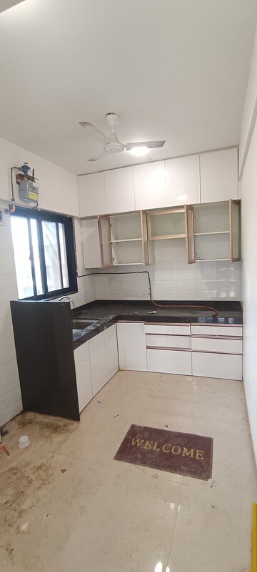 Kitchen in 2 BHK Apartment at Jeevan Sona Apartment, Santacruz West – for Sale