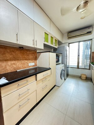 Kitchen in 2.5 BHK Apartment at Oberoi Realty Woods, Goregaon East – for Rent