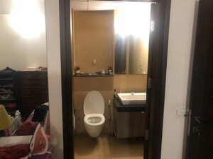 Bathroom in 4 BHK Apartment at Tata Raheja Raisina Residency, Sector 59 – for Sale