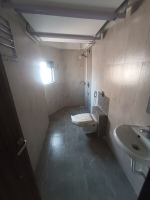 Bathroom in 3 BHK Apartment at Mutha Sai Nirvana, Shahad – for Rent