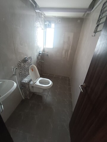 Bathroom in 3 BHK Apartment at Mutha Sai Nirvana, Shahad – for Rent