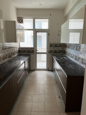 Kitchen in 3 BHK Apartment at Sushma Crescent, Dhakoli – for Sale