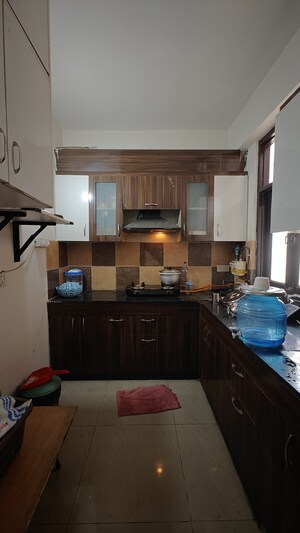 Kitchen in 3 BHK Apartment at Raj Nagar Extension – for Sale