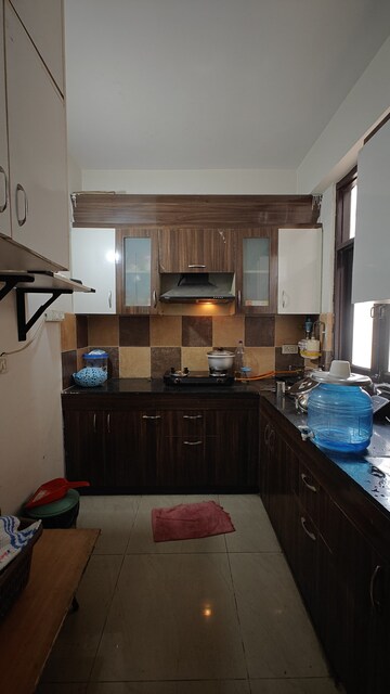Kitchen in 3 BHK Apartment at Raj Nagar Extension – for Sale