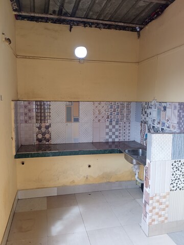 Kitchen in 1 RK Independent House at Beltola Tiniali Bus Stop – for Rent