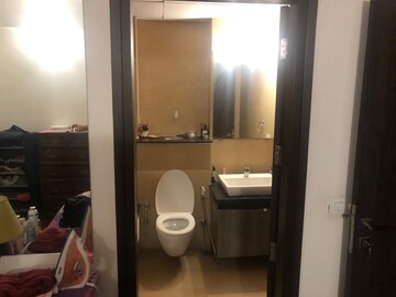 Bathroom in 4 BHK Apartment at Tata Raheja Raisina Residency, Sector 59 – for Sale